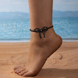 Cavigliera Nera con Fiocco in Cristallo – Elegante Donna Estate 2026