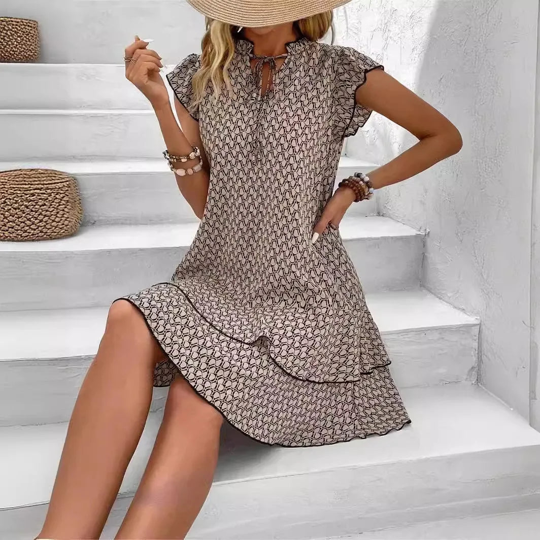 Abito Estivo Donna Boho Lido Nova, leggero mini dress con stampa colorata e scollo a V, perfetto per l'estate.