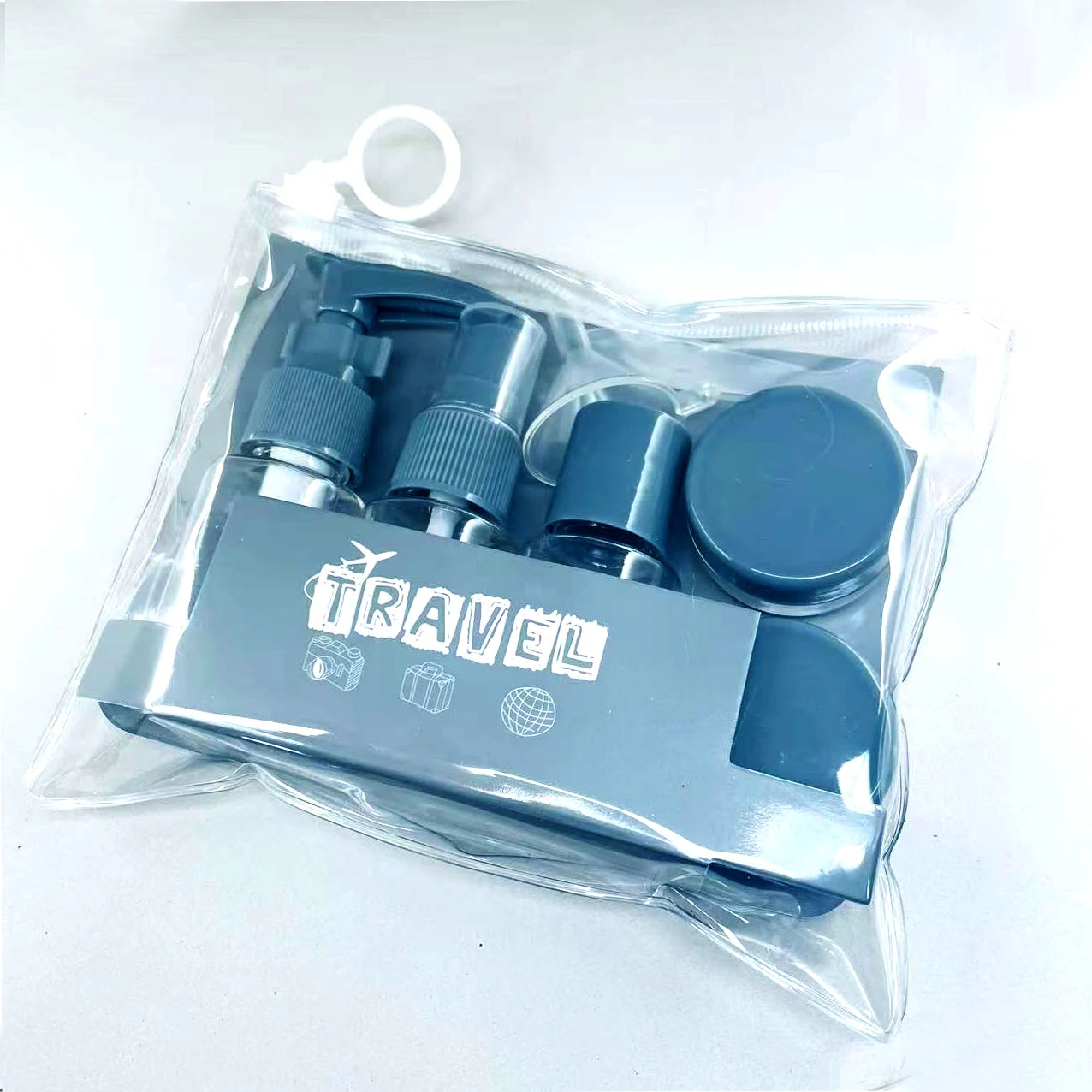 Travel Set 7 pz con Pochette – Flaconi + Spray (1 set)