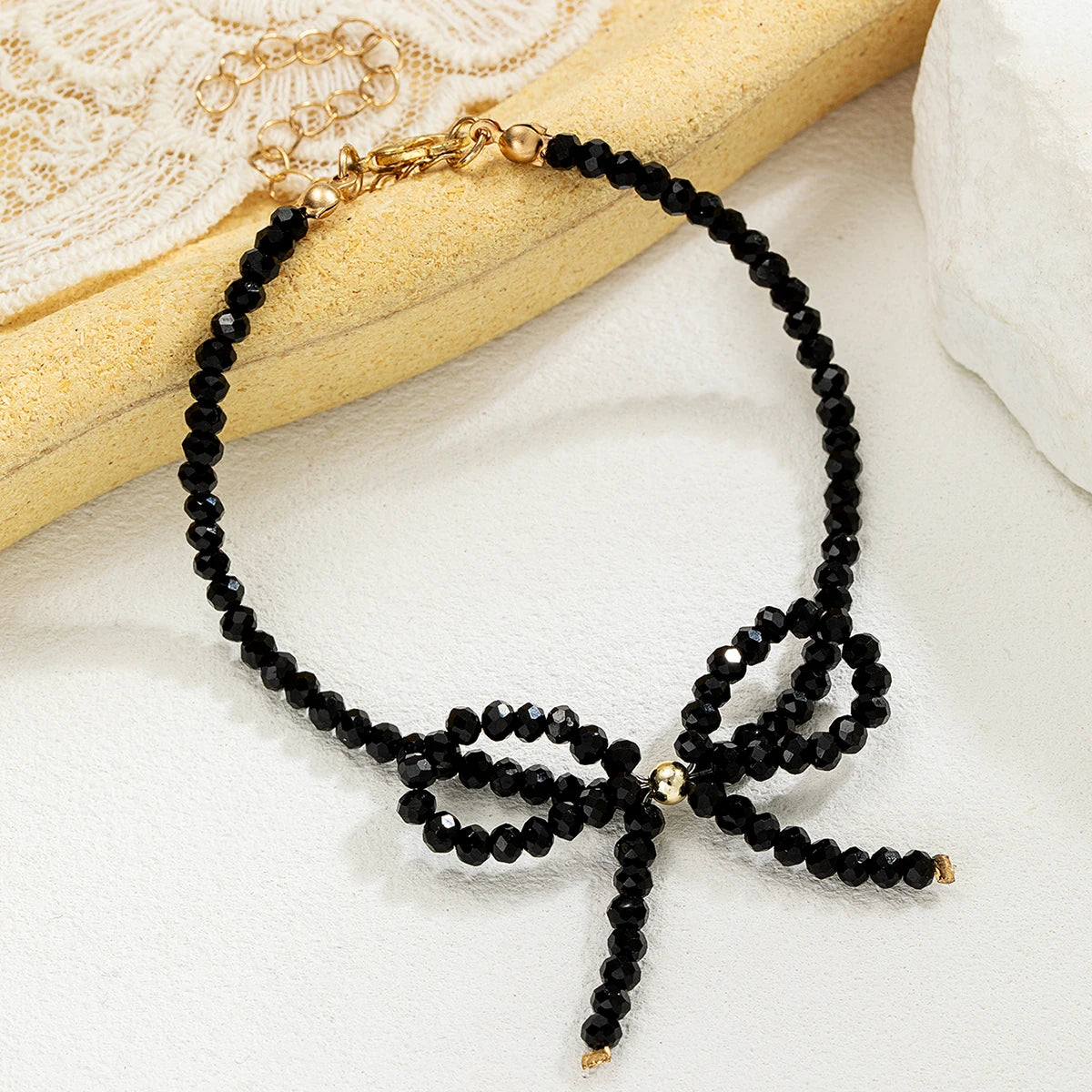 Cavigliera Nera con Fiocco in Cristallo – Elegante Donna Estate 2026