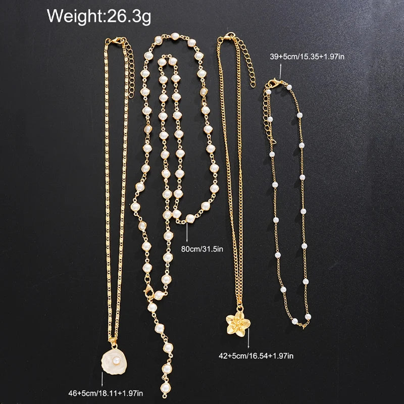 Set 4 Collane Boho Vintage con Conchiglie, Perle & Fiori – Donna Estate 2026