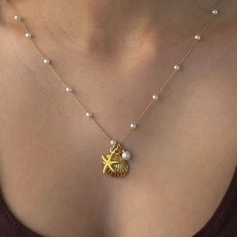 Collana Boho Dorata con Conchiglia & Perla – Charm Geometrico Donna Estate 2026